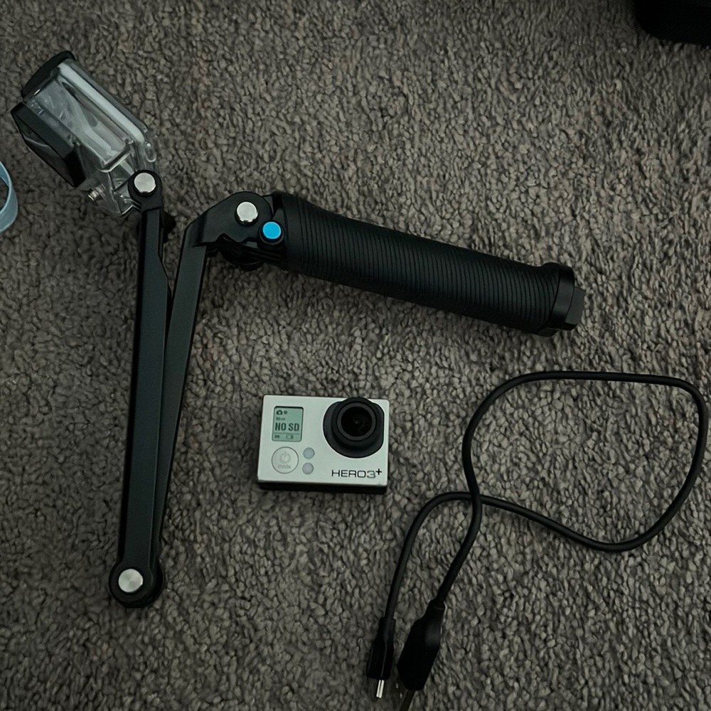 Go Pro Hero 3 with waterproof case and charging cable